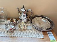 All five D'Oro silver-plated pieces displayed