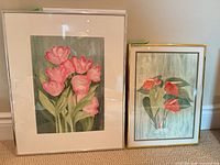 Both framed botanical watercolours side-by-side
