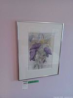 Full view of framed watercolor on wall