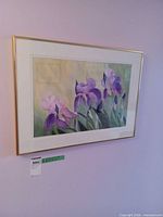 Full view of framed watercolor on wall