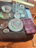 Group shot of all glassware and napkins on table