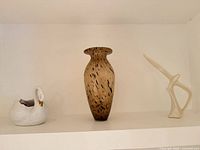 Group shot of all three items on shelf