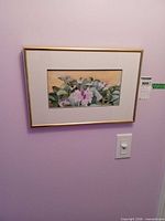 Full view of framed watercolor on wall