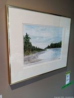 Oblique view of framed painting on wall