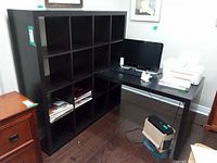 Front view of cubby bookshelf and attached desk