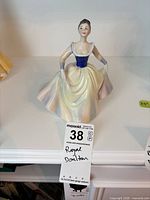 Front view of Royal Doulton Lisa figurine with tag visible