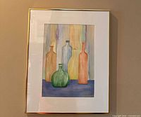 Full view of framed watercolor showing bottles