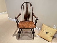 Front view of solid wood Windsor armchair