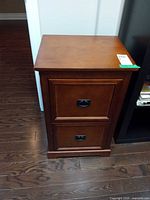 Front view showing two drawers and finish