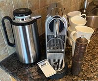 Coffee maker, carafe, four of six cups, grinder