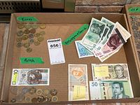 Overview of lot showing Euros, Polish section, Croatian note, labels