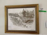 Full view of framed print on wall