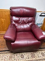 Front view of burgundy faux leather La-Z-Boy recliner