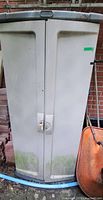 Front view of plastic outdoor storage cabinet