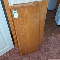 Front view of stacked wooden panels