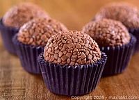 Stock-style photo of chocolate brigadeiro candies