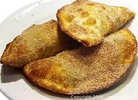 Fried pastries on plate – sample menu item from restaurant