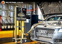 Take 5 Oil Change service bay with equipment, illustrative of brand