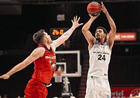 Ottawa BlackJacks player shooting over defender during CEBL game