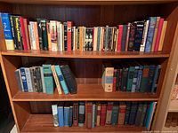 Full view of three shelves of books