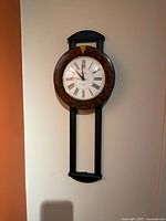 Full view of Bulova wall clock mounted on wall