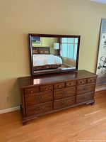 Front view of dresser with mirror