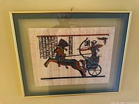 Front view of framed papyrus artwork