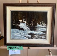 Front view of framed oil on canvas landscape painting showing full artwork and frame.