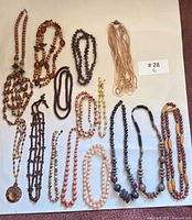 All 15 necklaces laid out for overview