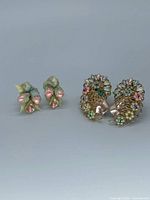 Both earring pairs side by side
