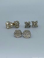 Group shot of three pairs of rhinestone earrings