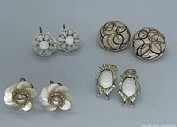 Group shot of all four earring pairs