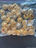 Bag with entire assortment of button covers