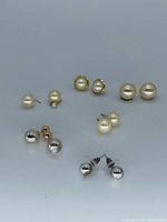 Group shot showing all seven pairs of studs