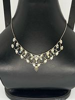 Front view of Brighton festoon necklace on display bust