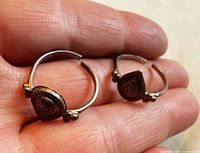 Both adjustable sterling silver rings side by side