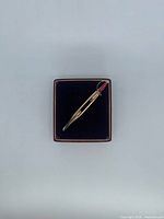 Tie clip in box, full view