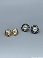 Both pairs of earrings side by side for overview