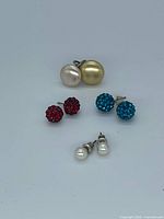Group shot of all four earring pairs
