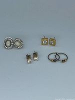 All four earring pairs displayed