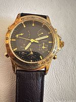 Front view showing dial, bezel, and strap