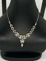 Necklace on bust showing front view and drop pendant