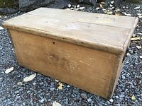 Front and top view of pine storage chest showing overall form and wear