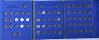 Folder opened to show three panels with coins seated in various year slots