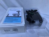 Retail box, instruction manual and sprinkler unit in plastic tray
