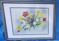 Front view of framed watercolor painting showing floral subject, matting and frame