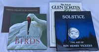 Front covers of all four oversized hardcover art books