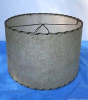 Full view of beige fiberglass drum lampshade