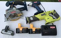 All tools, batteries and charger laid out
