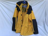 Front view of Viking yellow/black rain jacket